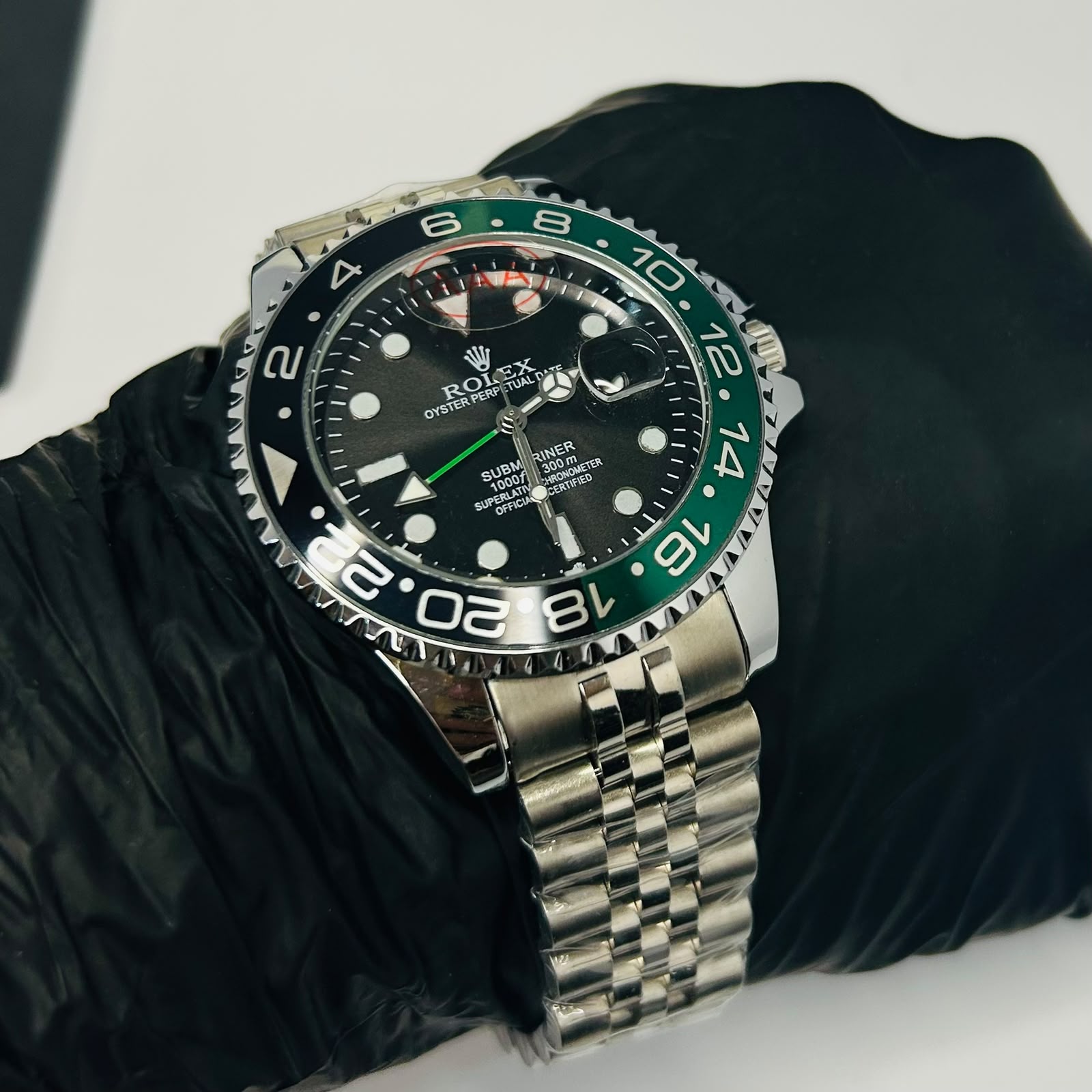 Rolex GMT Master II Green & Black Bezel Jubilee Watch